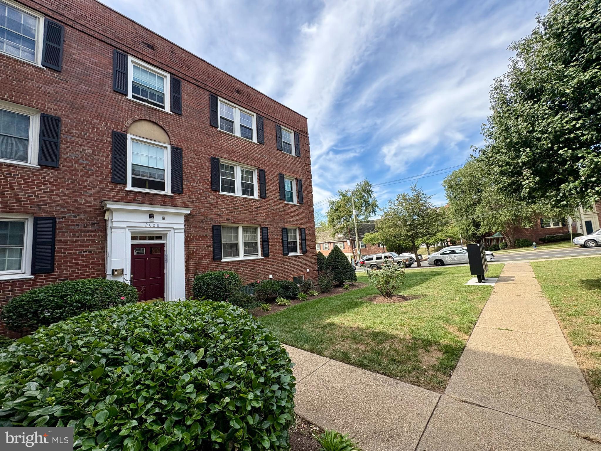 2008 38th Street Southeast, Unit 302 Washington, DC 20020 - Photo 22 of 25 a brick building view with a garden