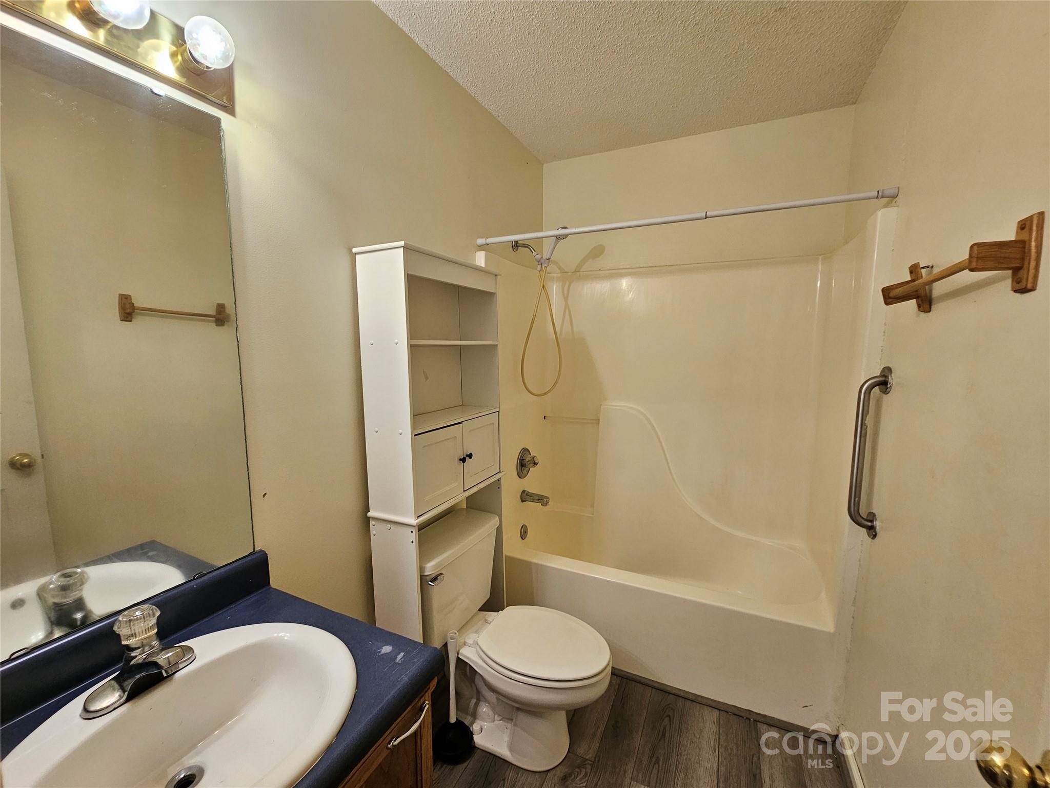 130 Susan Road, Unit 2 Casar, NC 28020 - Photo 11 of 12 a bathroom with a sink toilet and shower