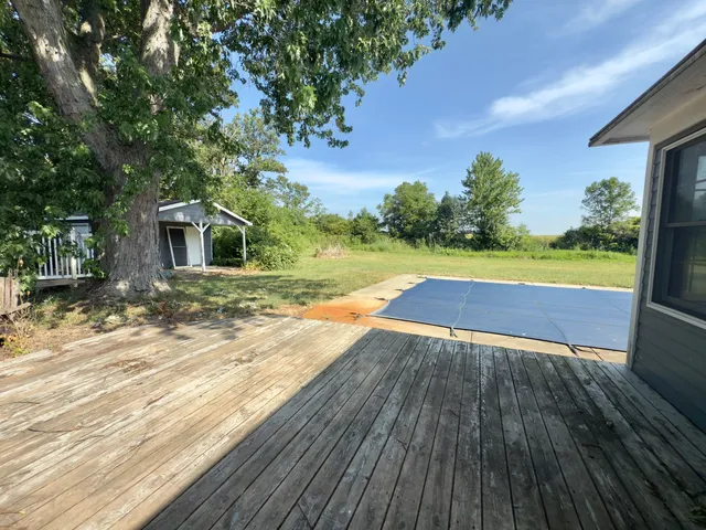 a view of a backyard with a garden