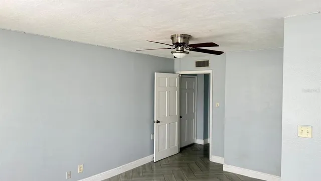 an entryway with wooden floor