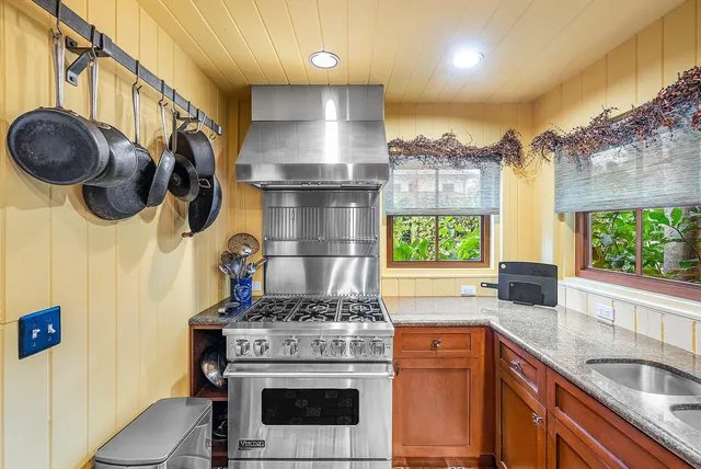 a bedroom with a bed and a view of bedroom