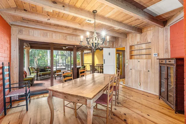 an aerial view of a houses with yard