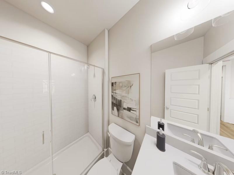 7696 Elizabeth Drive Oak Ridge, NC 27310 - Photo 14 of 29 Guest Suite Bathroom-Virtual Representation Not actual home - Some Features may be different in actual home.