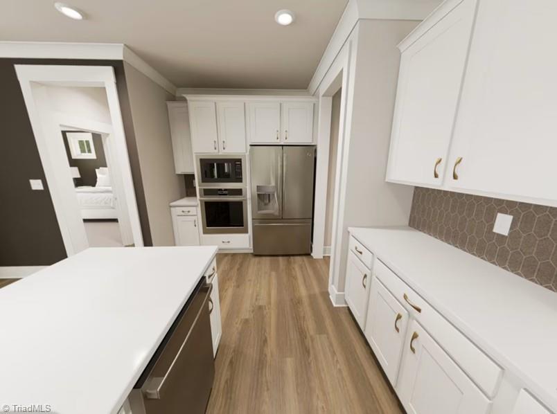 7696 Elizabeth Drive Oak Ridge, NC 27310 - Photo 6 of 29 Kitchen-Virtual Representation Not actual home - Some Features may be different in actual home.