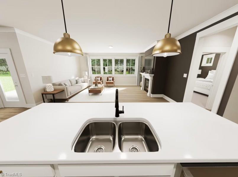 7696 Elizabeth Drive Oak Ridge, NC 27310 - Photo 8 of 29 Kitchen/Family Room-Virtual Representation Not actual home - Some Features may be different in actual home.