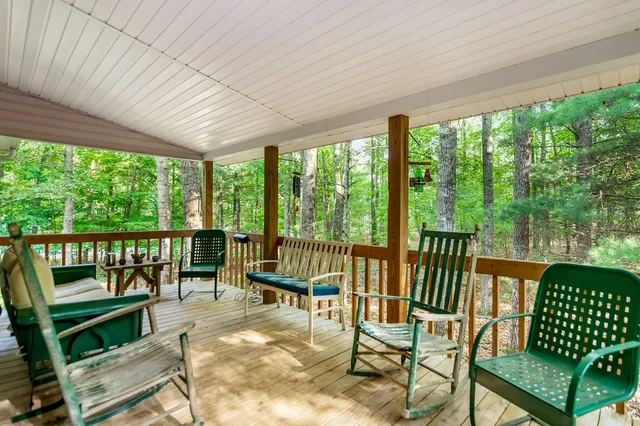 a view of a living room and a floor to ceiling window in the balcony