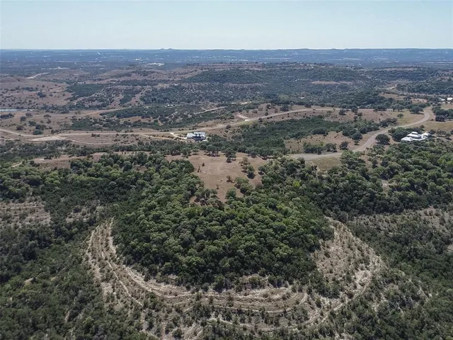 a view of a backyard of a house