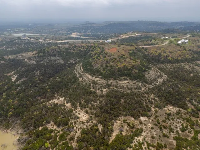 a view of city with ocean