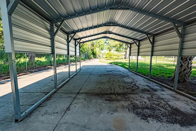 a view of backyard with green space