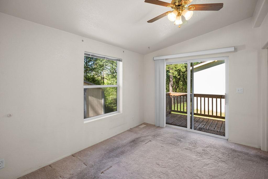 1281 Pleasant Valley Road, Unit 44 Diamond Springs, CA 95619 - Photo 12 of 27 an empty room with a window