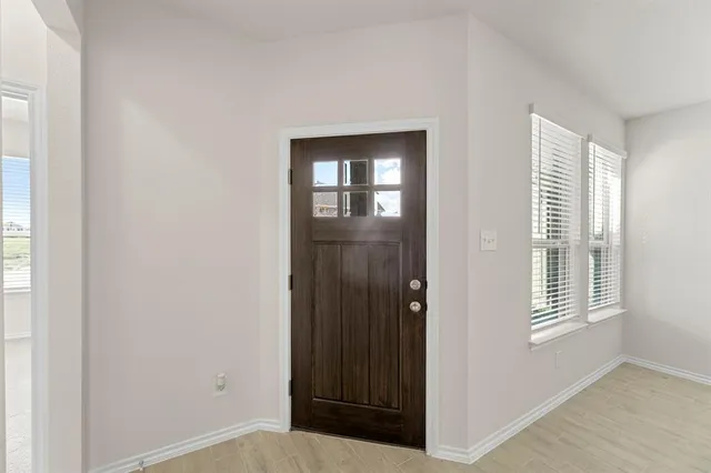 a view of hallway with windows