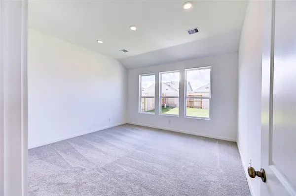 an empty room with windows