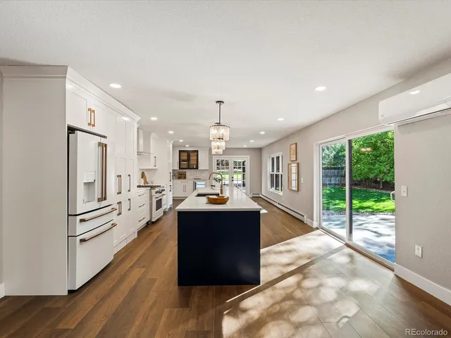 a kitchen with cabinets and sink