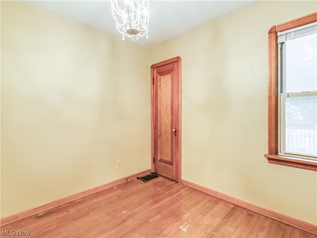 4349 Broadview Road Richfield, OH 44286 - Photo 15 of 20 Empty room with light hardwood flooring and a wealth of natural light