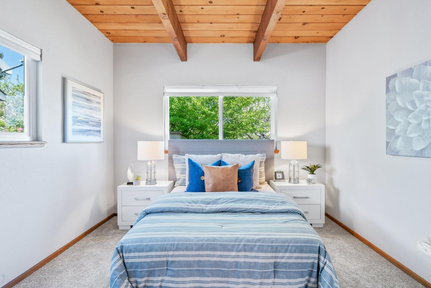 620 Sumner Street Santa Cruz, CA 95062 - Photo 17 of 45 a bedroom with a bed and a window