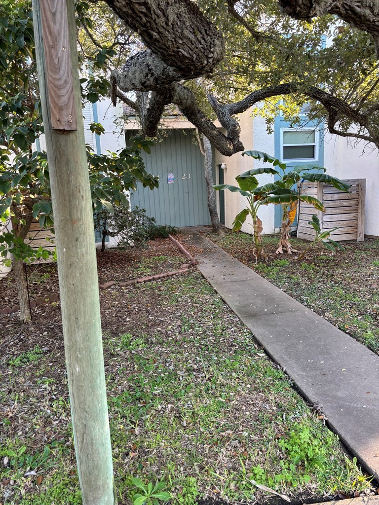 2003 North Fulton Beach Road, Unit 23 Rockport, TX 78382 - Photo 3 of 23 a view of a house with a yard