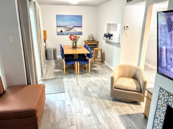 a living room with furniture and a couch