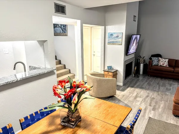 a living room with furniture and a window