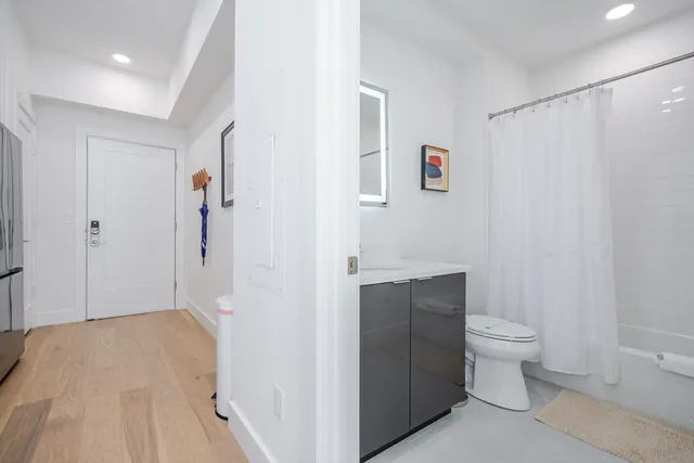 a bathroom with a sink and toilet