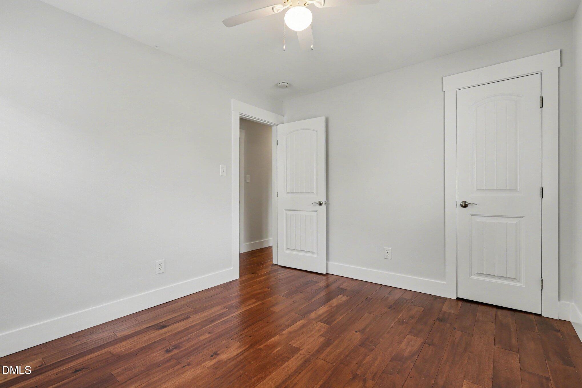 727 South State Street Raleigh, NC 27601 - Photo 17 of 30 a view of an empty room with wooden floor