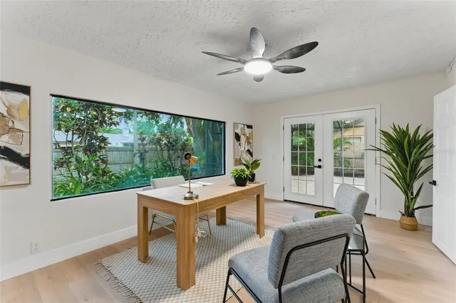 a view of a livingroom with furniture window and outside view