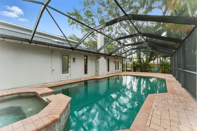 a view of a storage & utility room with a sink
