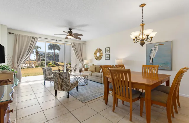 a kitchen with stainless steel appliances a refrigerator a sink a stove and cabinets