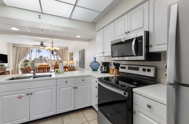 a bedroom with a bed and a television in it