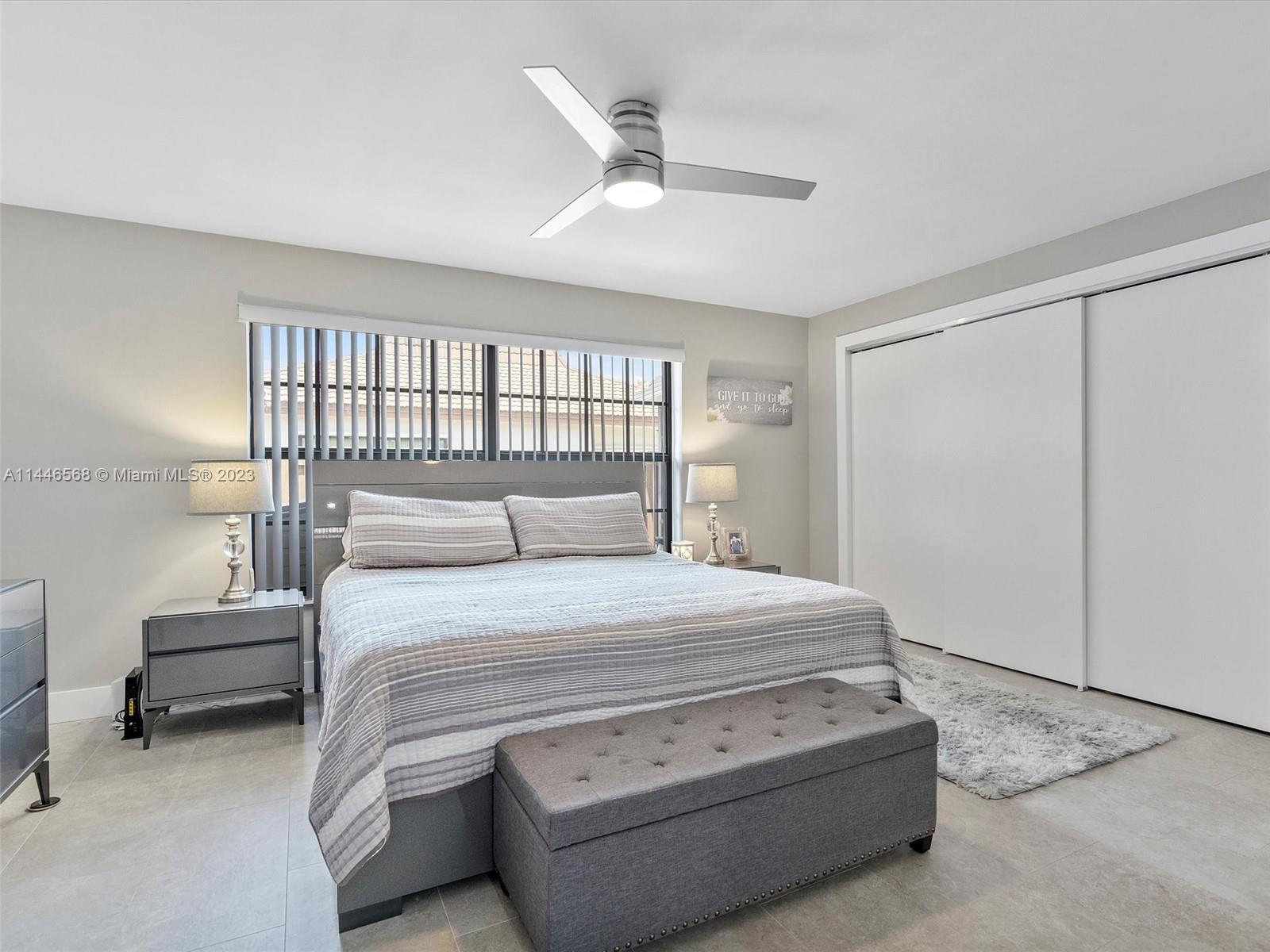 2358 Southwest 70th Way, Unit 6 Davie, FL 33317 - Photo 13 of 55 a bedroom with a bed and a window