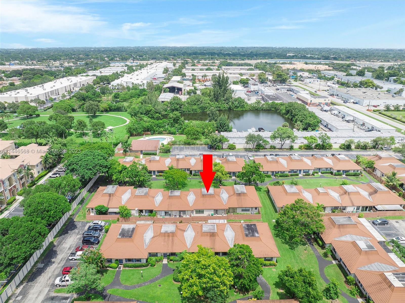 2358 Southwest 70th Way, Unit 6 Davie, FL 33317 - Photo 44 of 55 an aerial view of residential houses with outdoor space and lake view