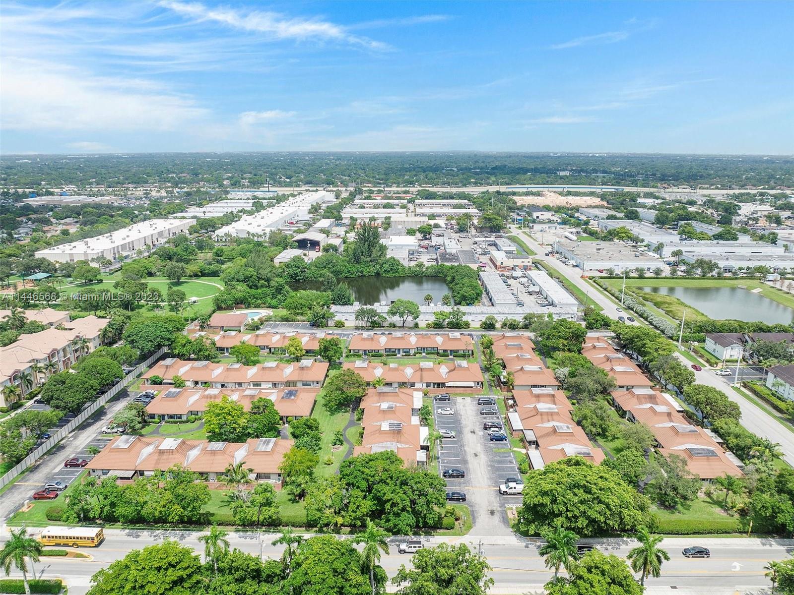 2358 Southwest 70th Way, Unit 6 Davie, FL 33317 - Photo 47 of 55 an aerial view of residential building with outdoor space