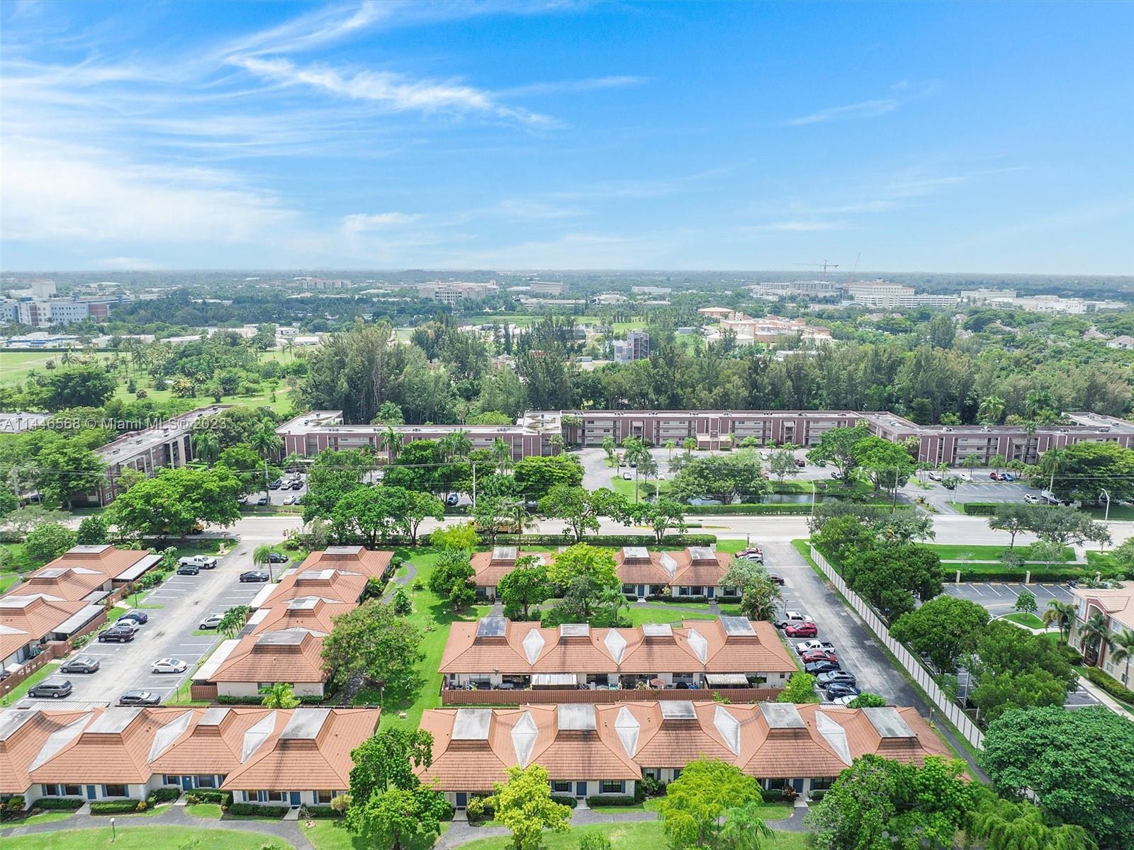2358 Southwest 70th Way, Unit 6 Davie, FL 33317 - Photo 55 of 55 an aerial view of residential houses with outdoor space and trees