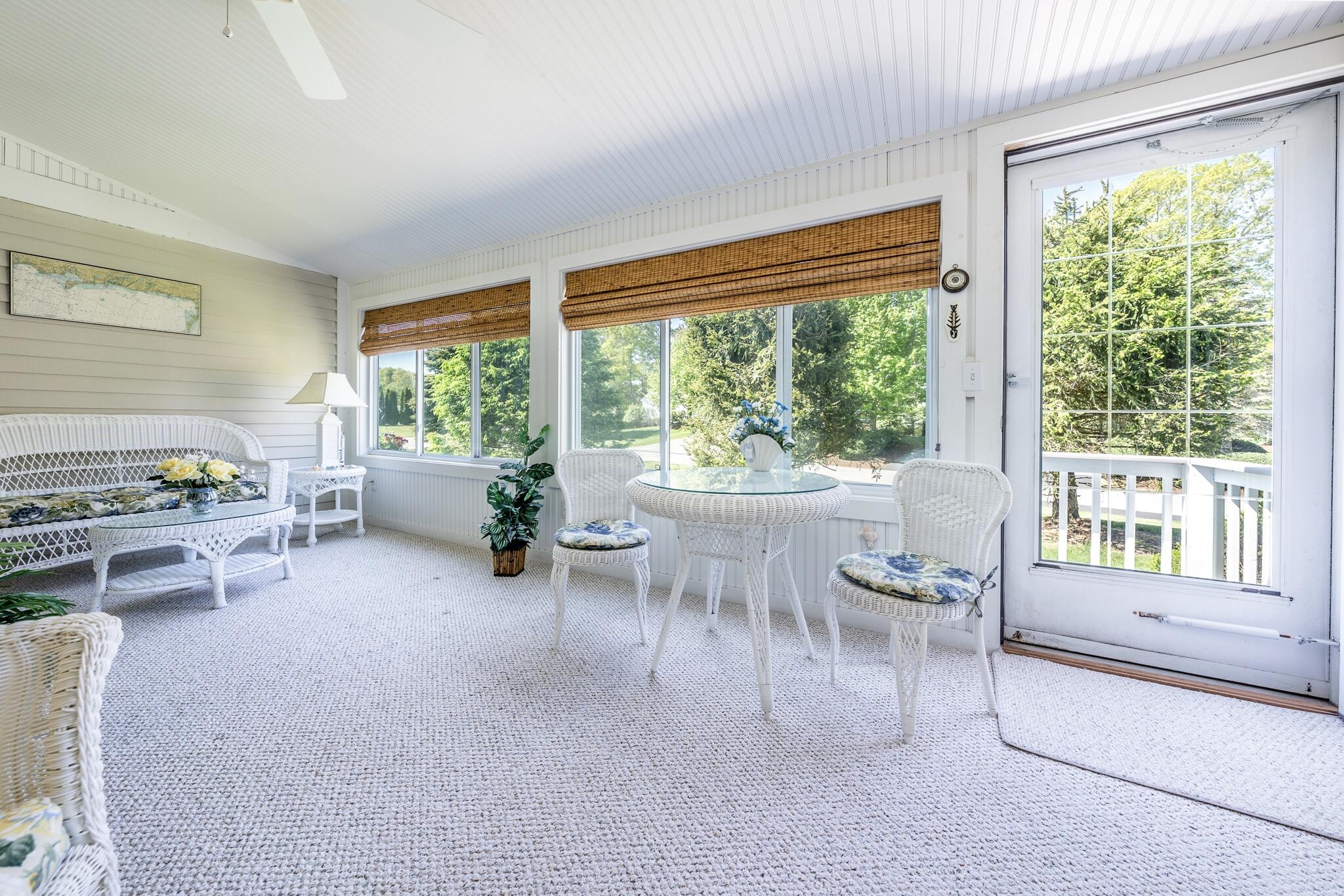 7 Masters Court Mashpee, MA 02649 - Photo 13 of 34 a living room with furniture and a large window