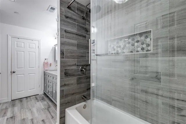 a bathroom with a bathtub