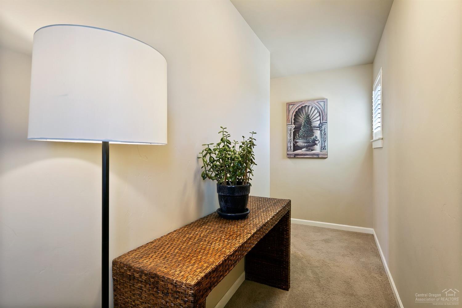 61068 Manhae Loop Bend, OR 97702 - Photo 17 of 24 Hallway separating master suite with oth