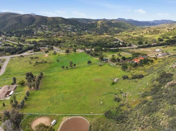 a view of a city and mountains ocean view