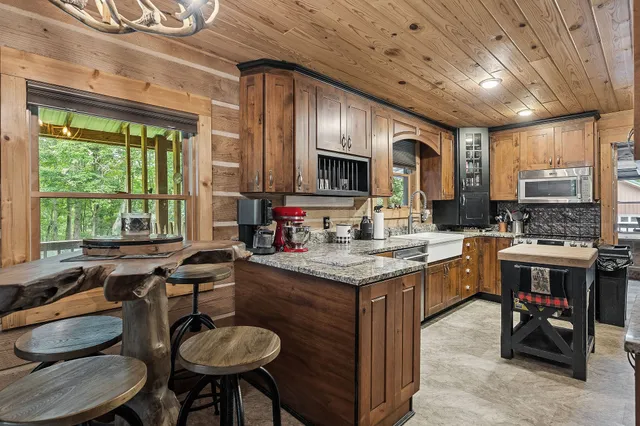 a view of a chair and table in the balcony