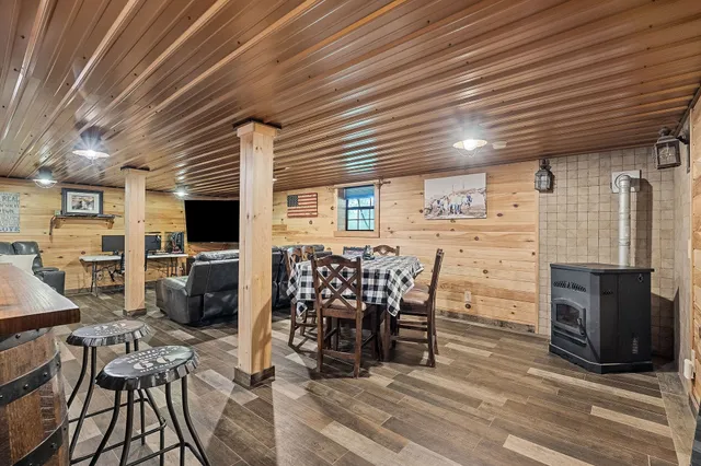 a view of a house with swimming pool and yard