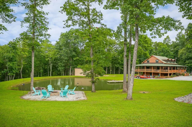 a bathroom with a sink vanity mirror and toilet