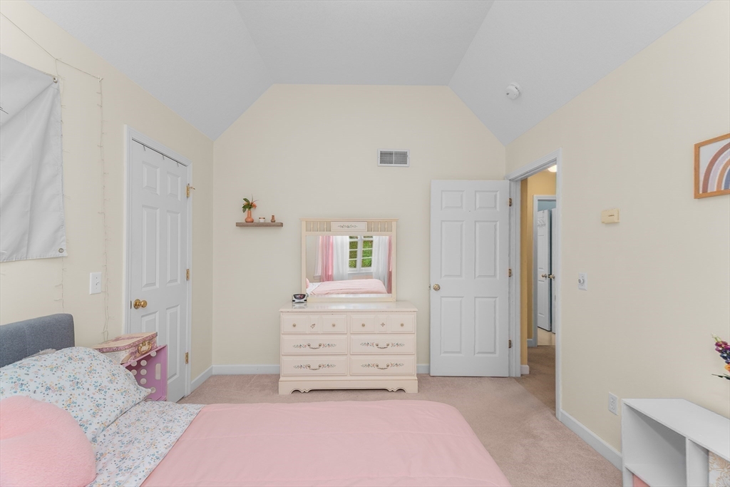 113 Greenwich Plains Road Ware, MA 01082 - Photo 31 of 42 a bedroom with a bed and a cabinets