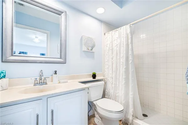 a bedroom with double bed and a closet