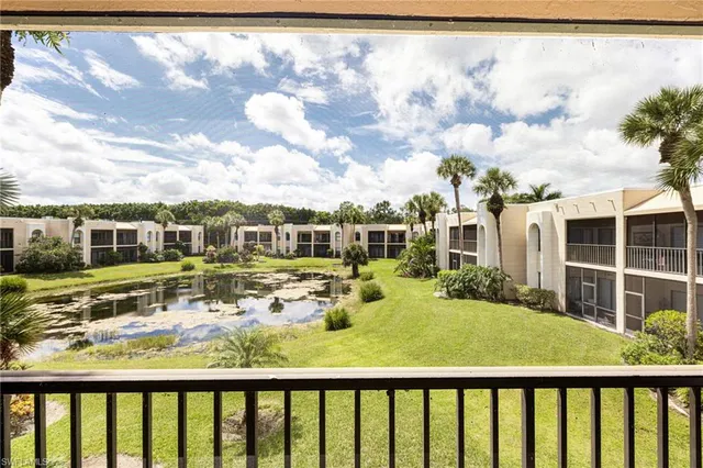 a view of a balcony with chair