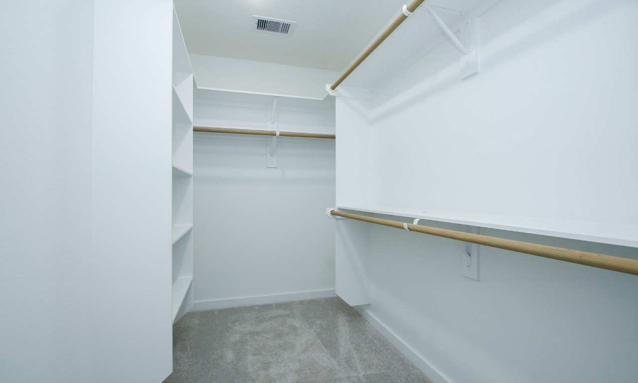 2717 Discovery Trails Conroe, TX 77301 - Photo 28 of 46 a view of an empty walk in closet