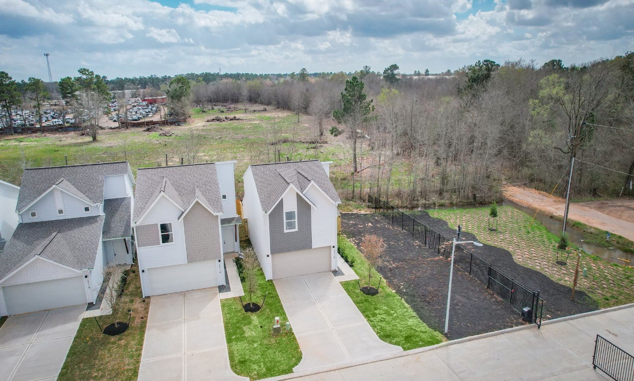 2717 Discovery Trails Conroe, TX 77301 - Photo 41 of 46 an aerial view of a house with garden