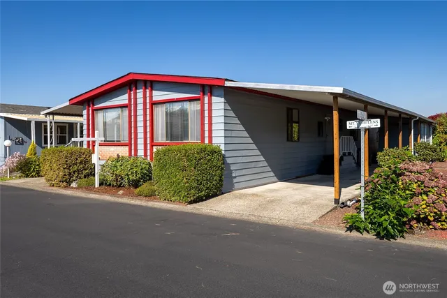 a front view of a house with yard
