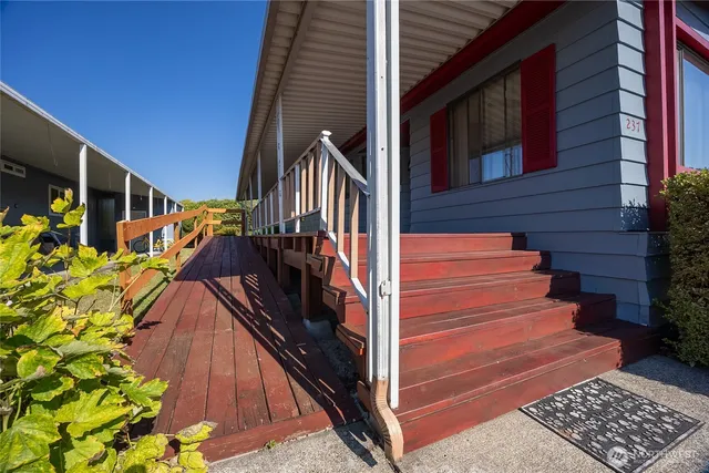 a view of stairs and with wooden floor