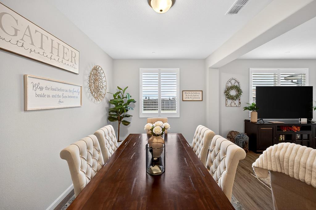 1397 Rio Grande Drive Plumas Lake, CA 95961 - Photo 13 of 54 a living room with furniture and a flat screen tv