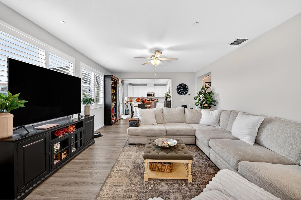 1397 Rio Grande Drive Plumas Lake, CA 95961 - Photo 14 of 54 a living room with furniture and a flat screen tv