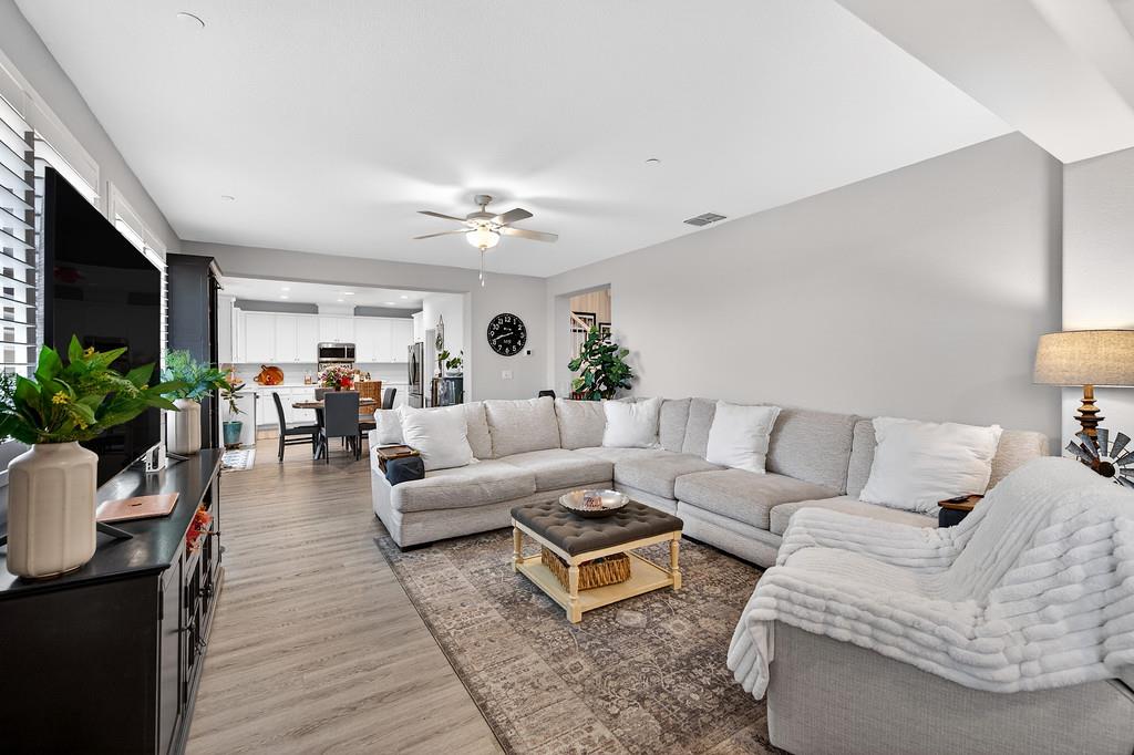 1397 Rio Grande Drive Plumas Lake, CA 95961 - Photo 15 of 54 a living room with furniture and a flat screen tv
