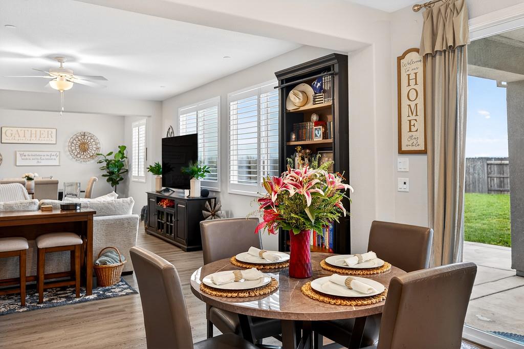 1397 Rio Grande Drive Plumas Lake, CA 95961 - Photo 20 of 54 a view of a dining room with furniture window and wooden floor